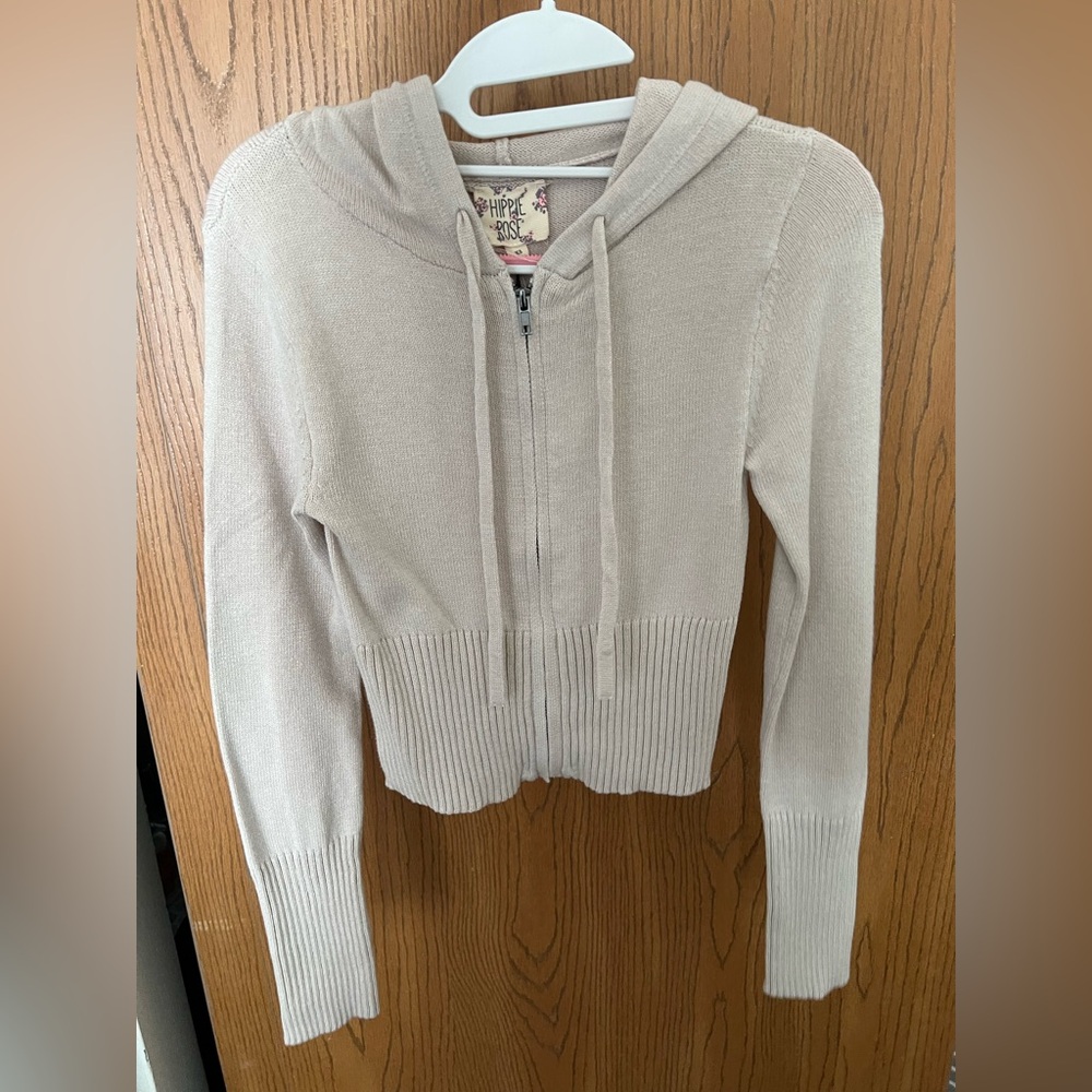 Brand new never worn. Long sleeve zip up sweater